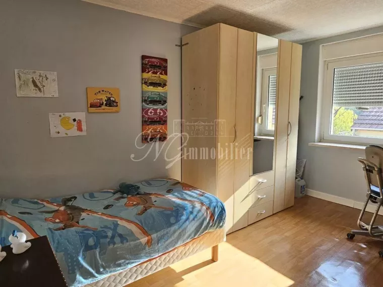 Maison Bi familiale ou Lot de 2 appartements de 95.79 m² et 93.72 m² avec terrasse et garage dans une rue calme d’Ottange (F-57)