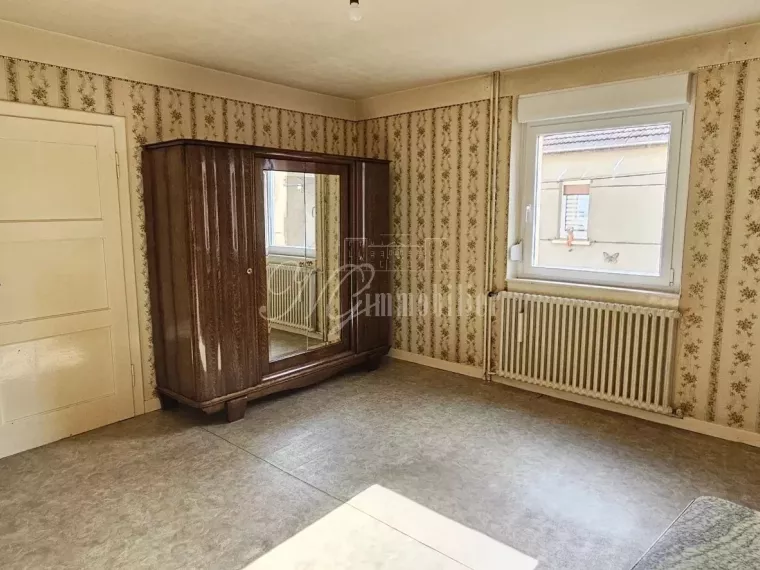 Maison Bi familiale ou Lot de 2 appartements de 95.79 m² et 93.72 m² avec terrasse et garage dans une rue calme d’Ottange (F-57)