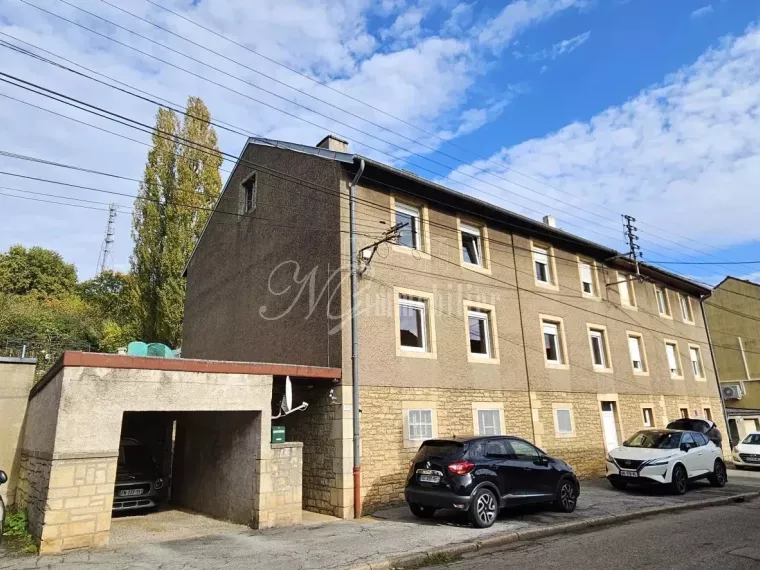 Maison Bi familiale ou Lot de 2 appartements de 95.79 m² et 93.72 m² avec terrasse et garage dans une rue calme d’Ottange (F-57)