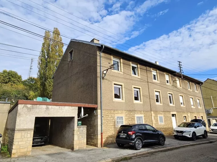 Maison Bi familiale ou Lot de 2 appartements de 95.79 m² et 93.72 m² avec terrasse et garage dans une rue calme d’Ottange (F-57)