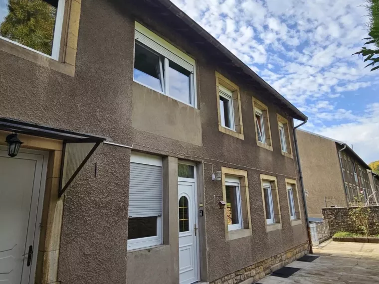 Maison Bi familiale ou Lot de 2 appartements de 95.79 m² et 93.72 m² avec terrasse et garage dans une rue calme d’Ottange (F-57)