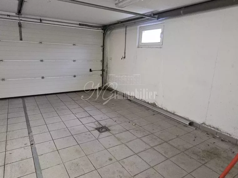 Appartement trois chambres de 89 m² avec place de parking extérieure et garage à Schifflange (LU)